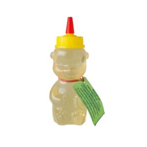 Blütenhonig in einer Bärenflasche